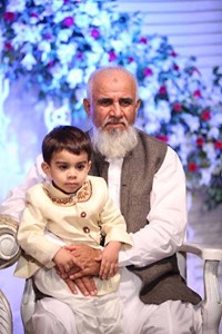 Aurangzeb Khan with his grandson